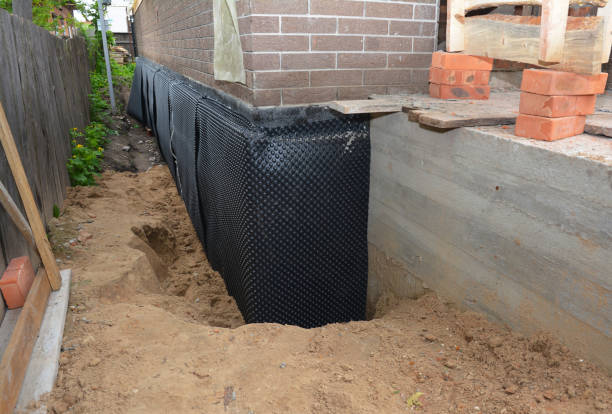 Happy homeowners after waterproofing job in Bulls Gap